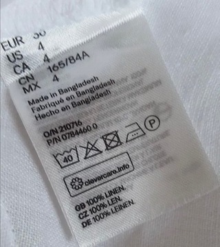 H&M Premium__Lniana biała bluzka z wiązaniem__36/S