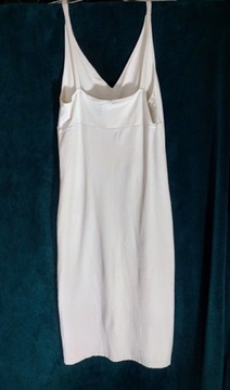 Szykowna biala sukienka. Made on Italia