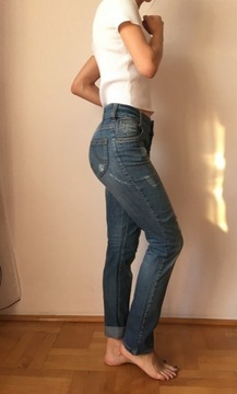 Niebieskie spodnie jeansy dżinsy KappAHL 38