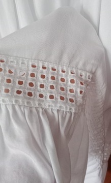 Nowa biała sukienka z ażurowymi rękawami falbanka 