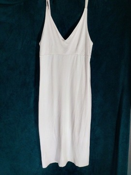 Szykowna biala sukienka. Made on Italia