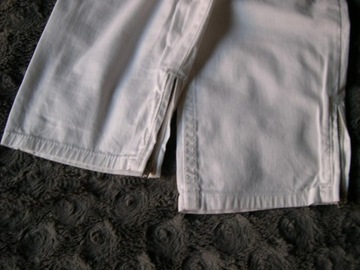 Spodnie damskie TOMMY HILFIGER roz. 36, białe