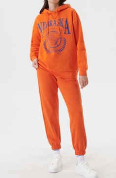 Sinsay Joggery spodnie dresowe pomarańczowe Zara