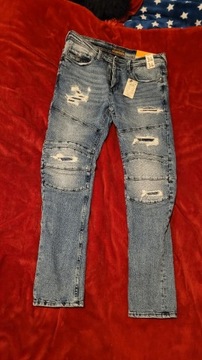 Nowe spodnie Cropp 34/34 Slim Jeans