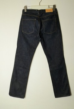 Acne Studios Max Raw luksusowe jeansy slim raw 