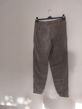 Luźne materiałowe spodnie khaki/szare L Next