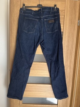 Granatowe spodnie męskie jeansy wrangler 38/32