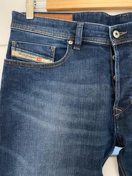 Markowe spodnie jeansowe 24/32 tommy calvin disel