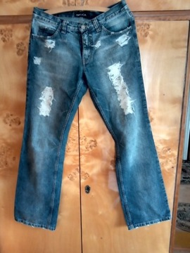 Spodnie jeansowe z przetarciami 30/32