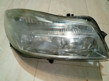 Reflektor lampa prawa Opel OE 13226783 EUR uszkodz