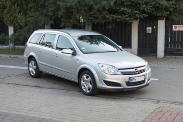 Belki Thule na reling. Opel Astra III kombi Wawa