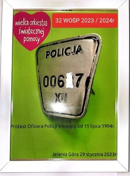 ramka ze zdjęciem odznaki policyjnej z1994r/32WOŚP