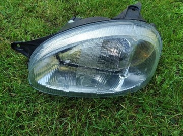 Reflektor Nowy GM lewy lampa Opel Corsa Combo B