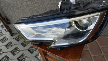 REFLEKTOR LAMPA PRZÓD LEWA Audi USA 8V0941005G