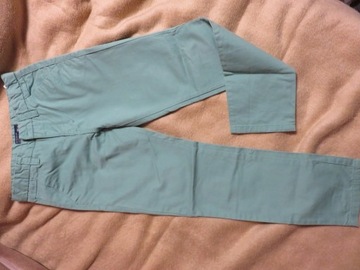 Jasno zielone spodnie - Reserved- rozm. 140 cm