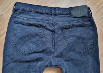 Granatowe Spodnie męskie jeans Lee Rider W32L30