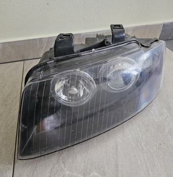 Lampa lewa Audi A4 B6 czarna EU