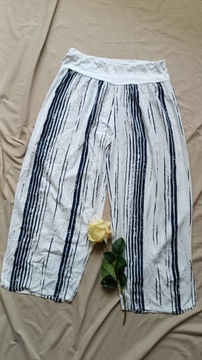 Pięknie spodnie włoskie spodnie made in italy 40 Białe w paski Z wiskozy