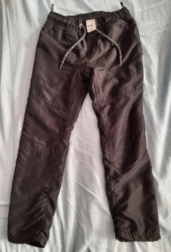 Ocieplane spodnie chłopięce C&A w rozmiarze 116