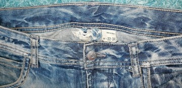 Spodnie Jeansy proste r EUR W32 L34 przetarcia 