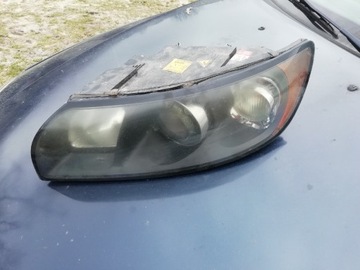 Lampa ksenon xenon czarny środek volvo s40 v50 04.