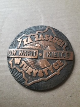 za zasługi w turystyce  UW WKFiT Kielce PTTK