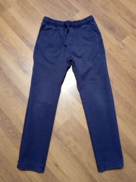 Granatowe spodnie Reserved r. 140