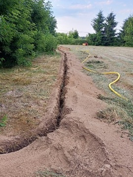 Usługi koparką ŁAŃCUCHOWĄ 