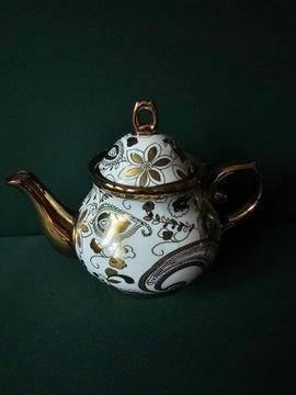 Porcelanowy czajnik złoty