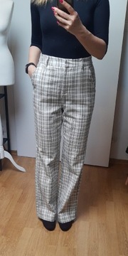 Beżowe eleganckie spodnie Mohito
