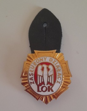 Złota odznaka "Zasłużony Działacz LOK"