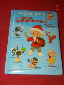 Książka z puzzlami Piaskowy Dziadek -jęz.niemiecki