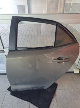 Drzwi Corolla E21 hatchback lewy tył 