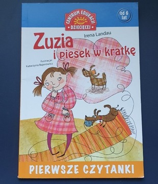 Zuzia i piesek w kratkę.