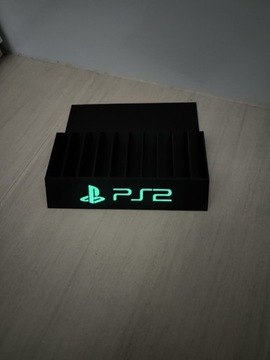 Stojak podstawka na gry PS2 PS3 PS4 PS5 XBOX Napis świecący 