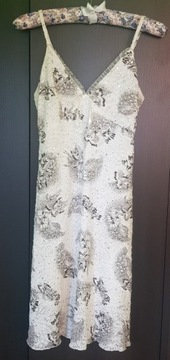 Elegancka kremowa sukienka z cekinami