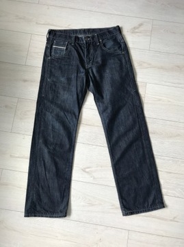 Granatowe spodnie jeansy dżinsy Levis 569 W30 L32