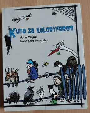 Kuna za kaloryferem Wajrak Selva Fernandez