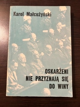 K. Małcużyński, Oskarżeni nie przyznają się...