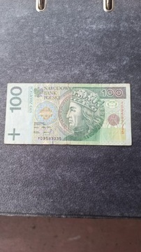 Banknot 100 złoty, seria zastępcza YD 9583335.