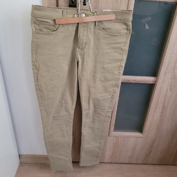 Spodnie jeansowe LEVI'S  STRAUSS  r. 31  kol. beż.