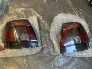 Lampy tylne Audi A4b5 sedan dym. i org. jak nowe