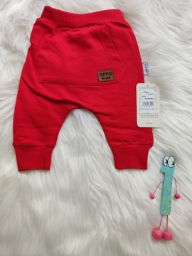 Czerwone spodnie niemowlęce z kieszeniami 62/68