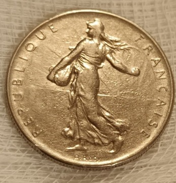 Dwie monety 1 frankowe z 1964 i 1974 roku