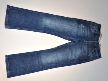 Chłopięce spodnie jeansowe marki MILLIONX 152 cm 