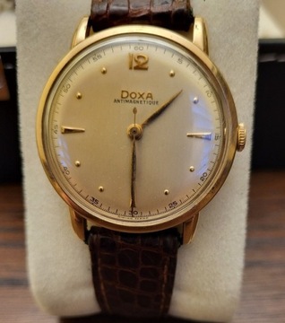 Złoty zegarek naręczny DOXA 14 K