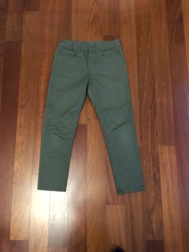 Zielone regulowane spodnie jeansy H&M. Rozmiar 140