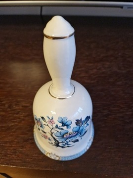 dzwonek porcelanowy z motywem kwiatowym. 