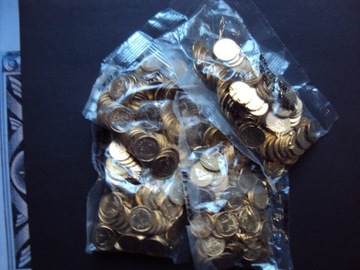 Monety 1gr. 100szt 2009r w szaszetce bankowej.