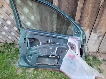 Drzwi lewe od kierowcy Opel Astra G na części